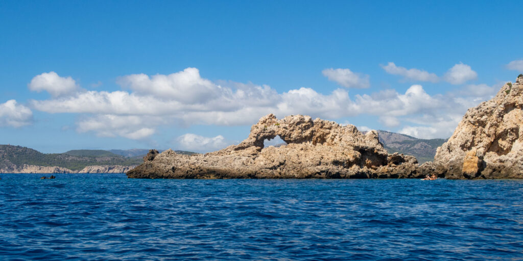 Crocodile rock: rock with a hole that looks like crocodile near Santa Ponsa, Mallorca.